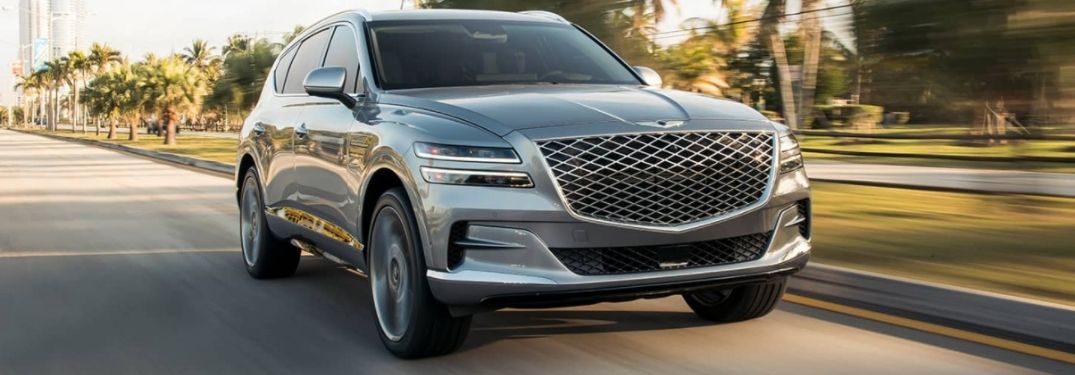 Silver 2021 Genesis GV80 Front Exterior Driving on a City Street