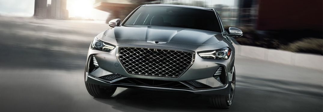 Silver 2021 Genesis G70 Front Exterior on a City Street