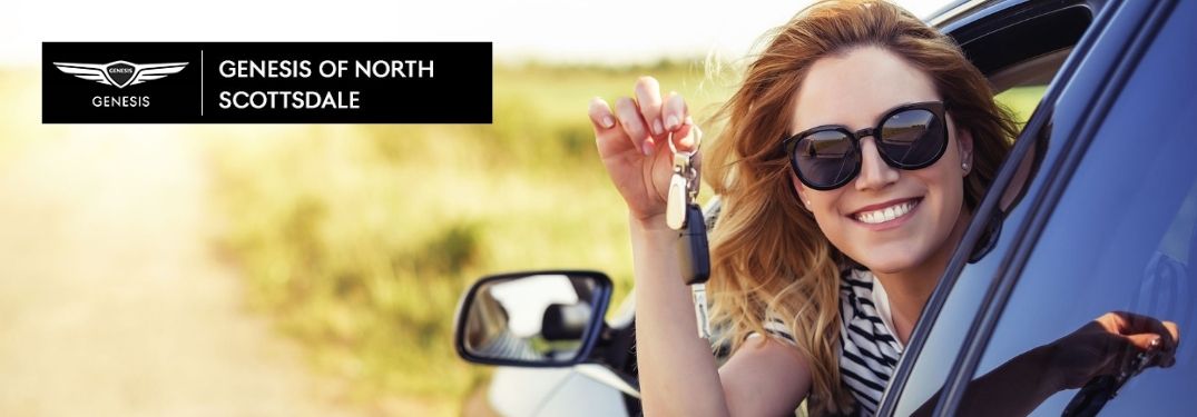 Happy Woman in New Car with Keys and Earnhardt Genesis of North Scottsdale Logo