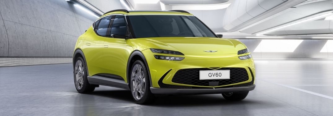 Yellow 2023 Genesis GV60 Front Exterior in a Modern Building