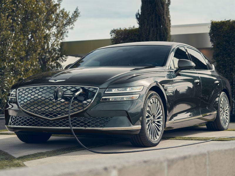 2025 Electrified G80 in Hallasan Green | 3/4 Front Driver Side, Car Charging