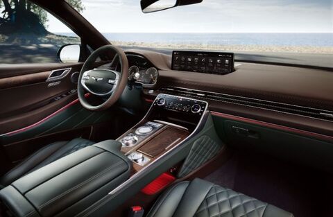 Genesis GV80 interior with a large touchscreen display.