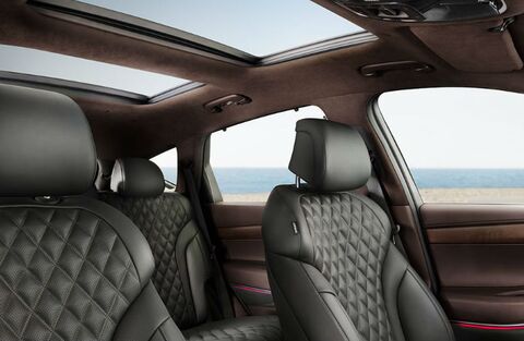 Genesis GV80 interior with a panoramic sunroof.