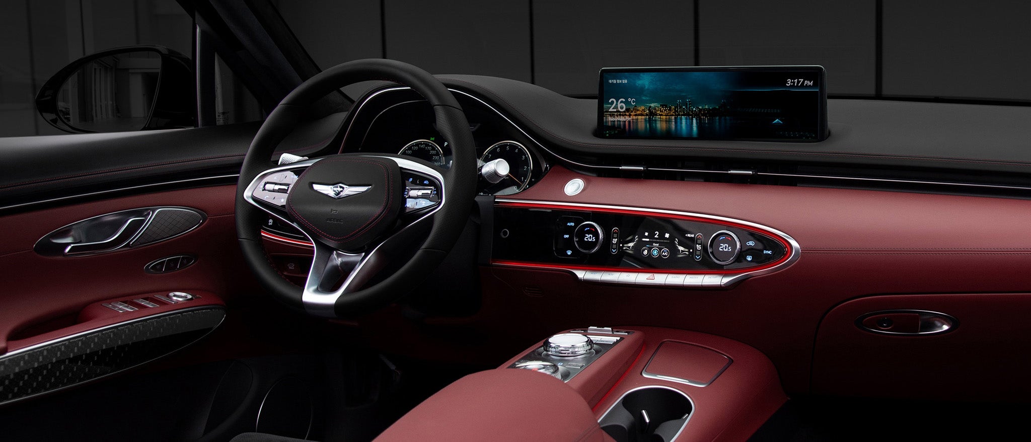 Genesis GV70 interior with a large touchscreen display.